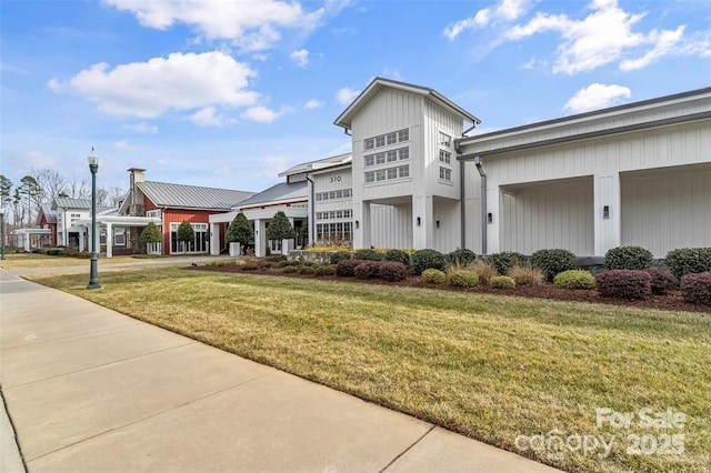 exterior space featuring a front lawn