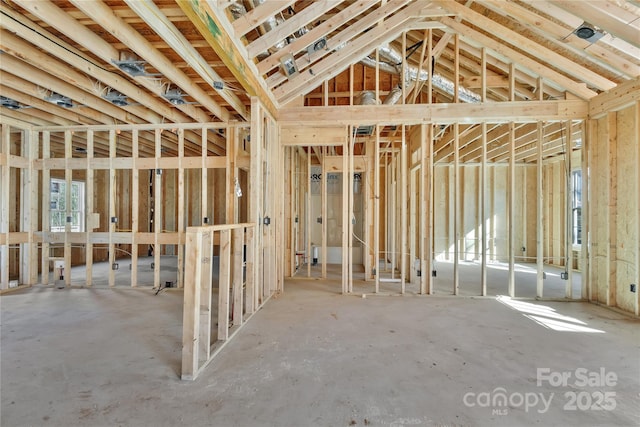 miscellaneous room featuring lofted ceiling