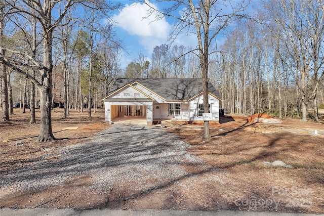 view of front of house featuring a carport