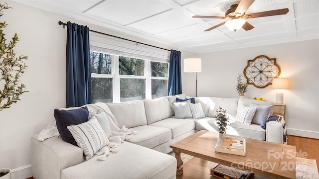 living room with hardwood / wood-style floors and ceiling fan