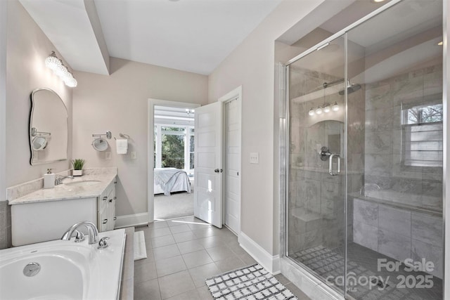 bathroom featuring vanity, tile patterned floors, and independent shower and bath