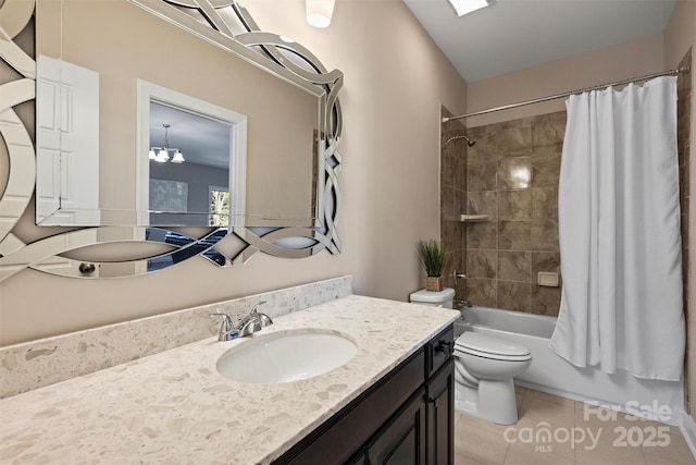 full bathroom featuring shower / tub combo, tile patterned floors, vanity, an inviting chandelier, and toilet