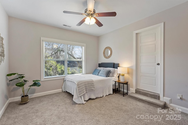 carpeted bedroom featuring ceiling fan