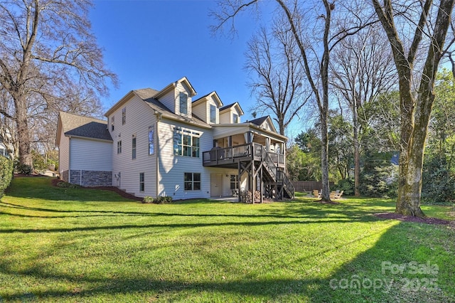 back of house with a yard and a wooden deck