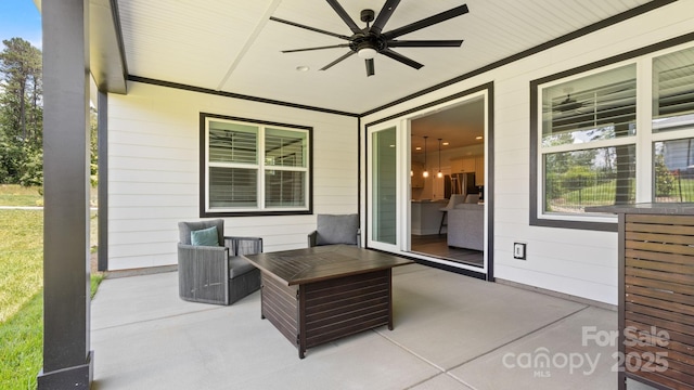 view of patio featuring ceiling fan