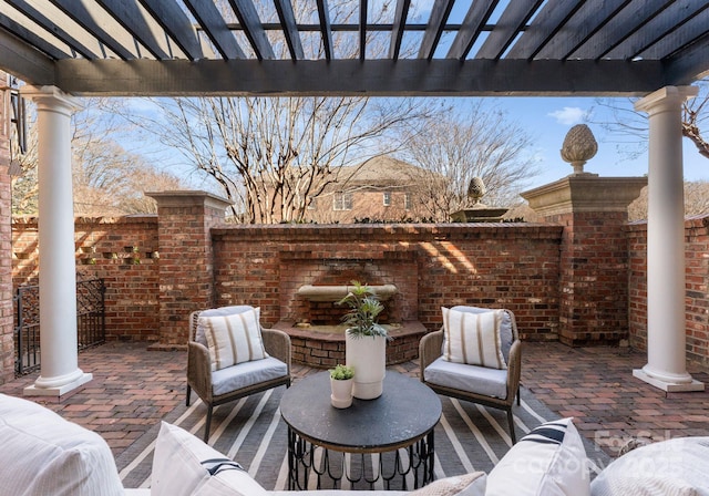 view of patio / terrace featuring outdoor lounge area and a pergola