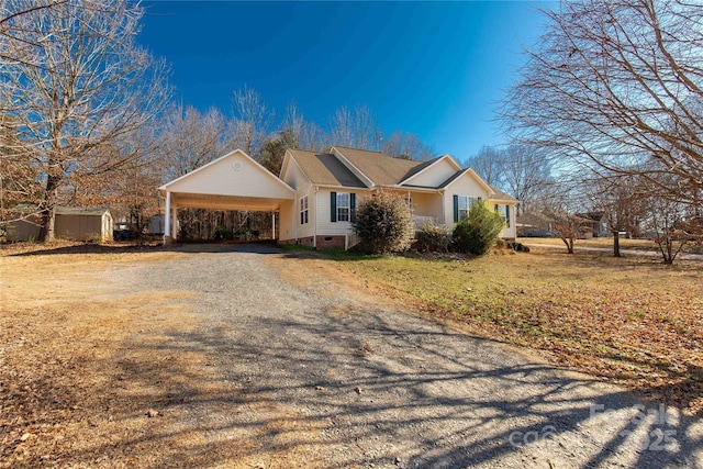 ranch-style home with a carport