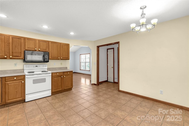 kitchen with hanging light fixtures, white electric range oven, a notable chandelier, a textured ceiling, and light tile patterned flooring