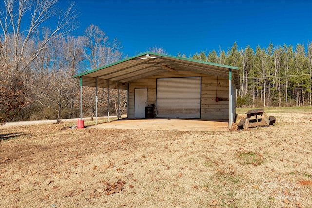 garage featuring a carport