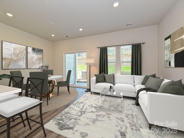 living room with light hardwood / wood-style flooring