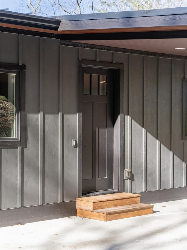 18 Cane Creek Ln, Fairview, NC 28730 - view of exterior entry featuring board and batten siding