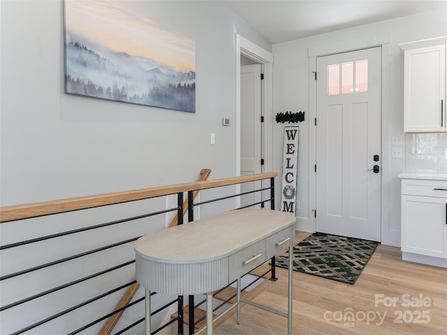 foyer entrance featuring light hardwood / wood-style floors