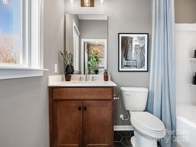 full bath featuring baseboards, toilet, shower / tub combo with curtain, tile patterned floors, and vanity