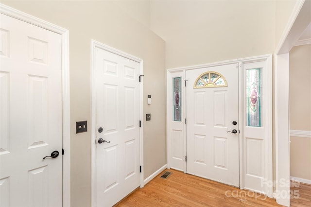 foyer entrance featuring light wood-type flooring