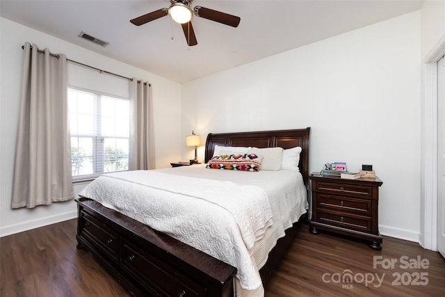 bedroom featuring ceiling fan and dark wood-type flooring