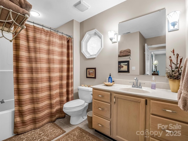 full bathroom featuring tile patterned floors, vanity, shower / bath combo, and toilet