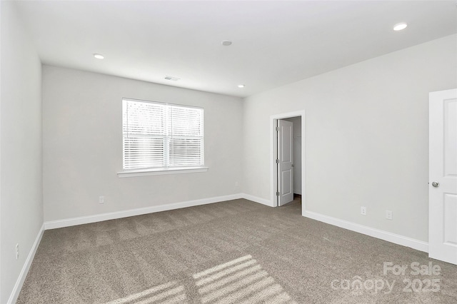 view of carpeted spare room