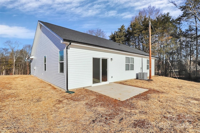 back of property featuring a patio area and central air condition unit