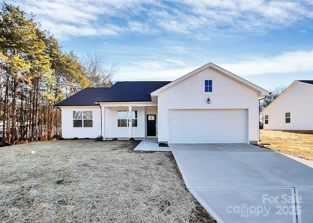 view of front of house featuring covered porch and a garage