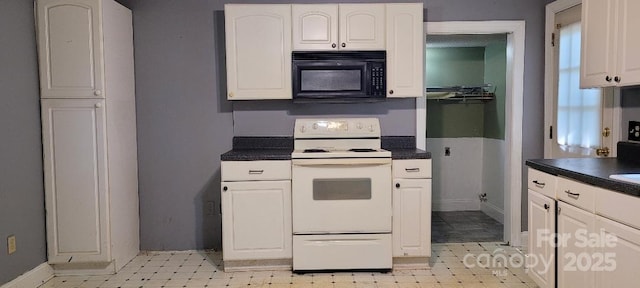 kitchen featuring white cabinetry and white range with electric cooktop