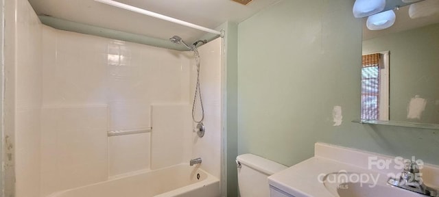 full bathroom featuring shower / tub combination, vanity, and toilet