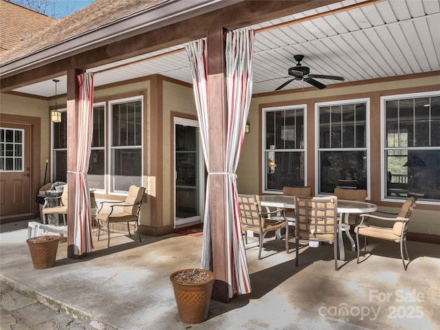 view of patio / terrace featuring ceiling fan and outdoor dining space