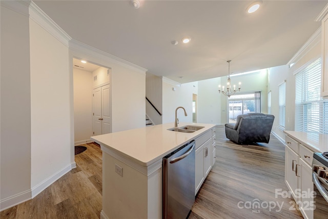 kitchen with white cabinets, an island with sink, stainless steel dishwasher, and sink