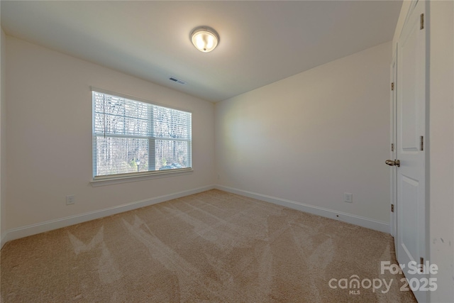 view of carpeted spare room