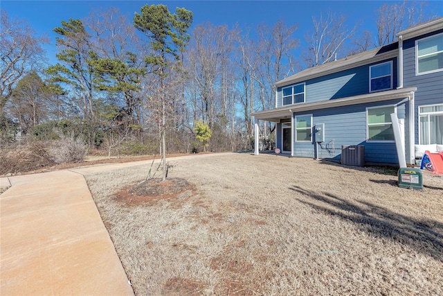 view of yard featuring central AC