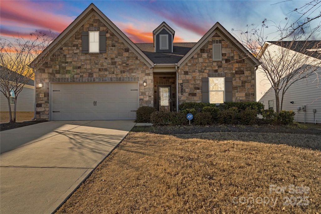 view of front of property featuring a garage