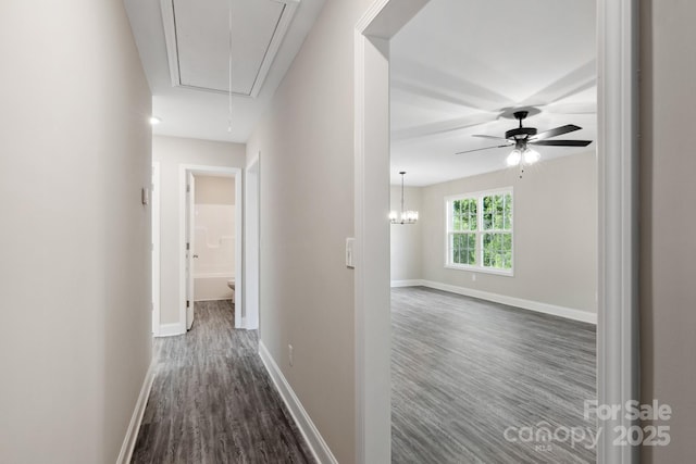 corridor with dark wood-type flooring