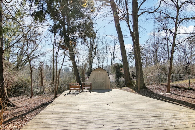 deck with a storage shed