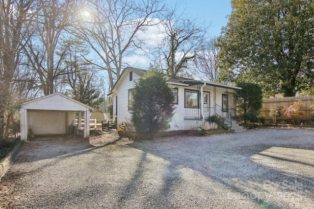 view of front facade with a carport