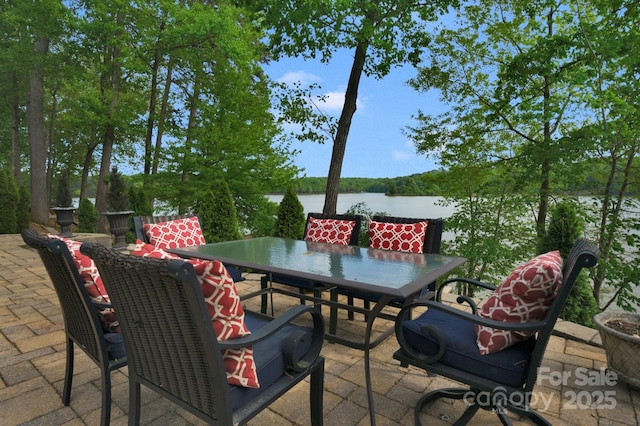 view of patio / terrace featuring a water view