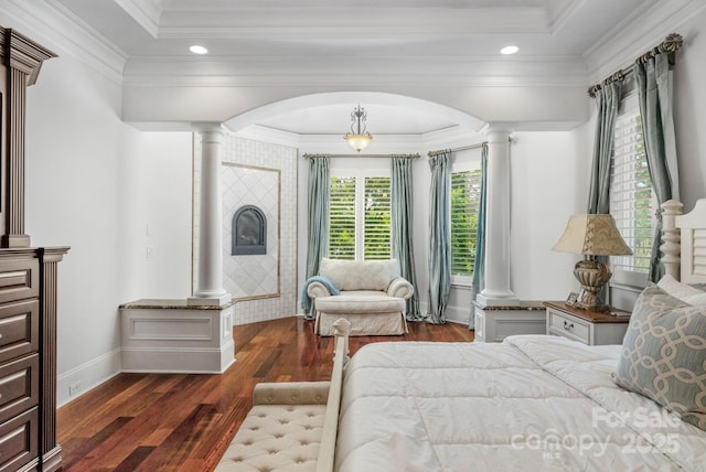 bedroom with dark hardwood / wood-style flooring and crown molding