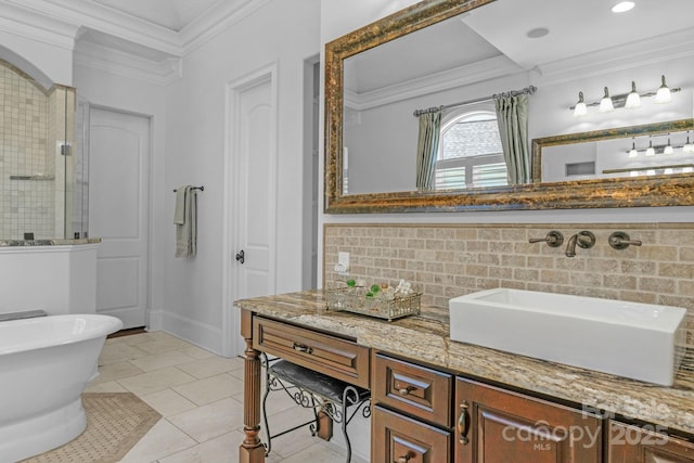 bathroom with tile patterned flooring, backsplash, shower with separate bathtub, vanity, and ornamental molding