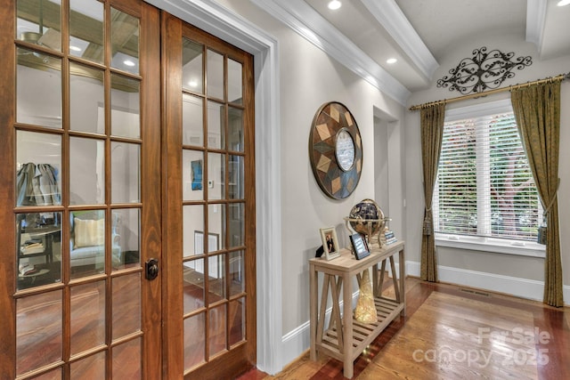 doorway featuring french doors, wood-type flooring, and lofted ceiling