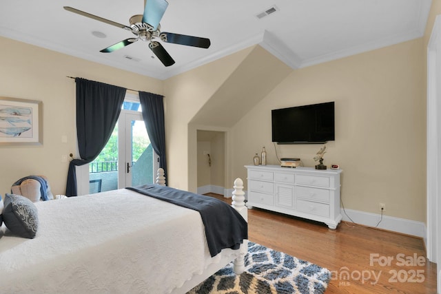 bedroom featuring hardwood / wood-style floors, french doors, ceiling fan, access to exterior, and ornamental molding