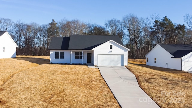 ranch-style home with a garage