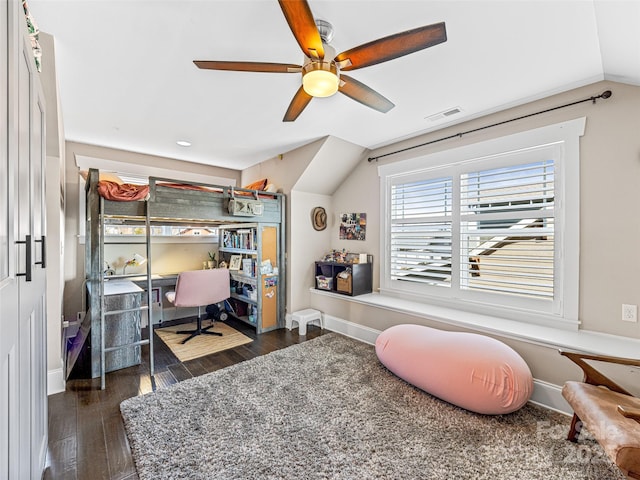 bedroom featuring ceiling fan, lofted ceiling, and dark wood-type flooring