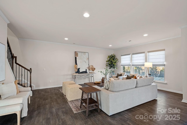 living room with dark wood-type flooring and crown molding