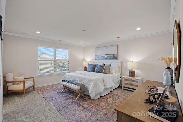 bedroom featuring ornamental molding and carpet