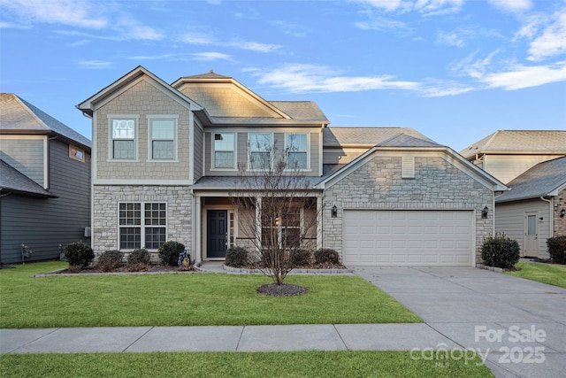 view of front facade with a front lawn and a garage