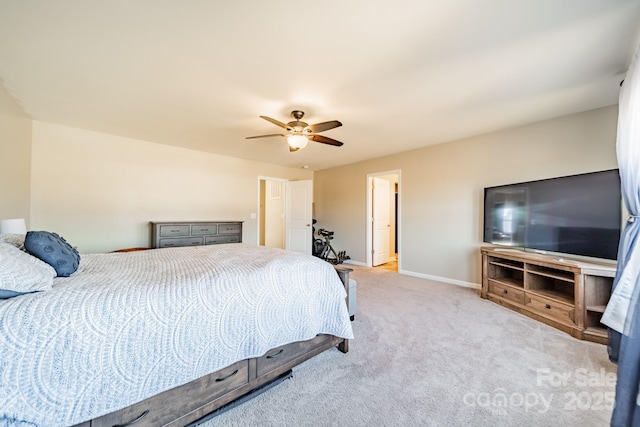 bedroom featuring ceiling fan and light colored carpet