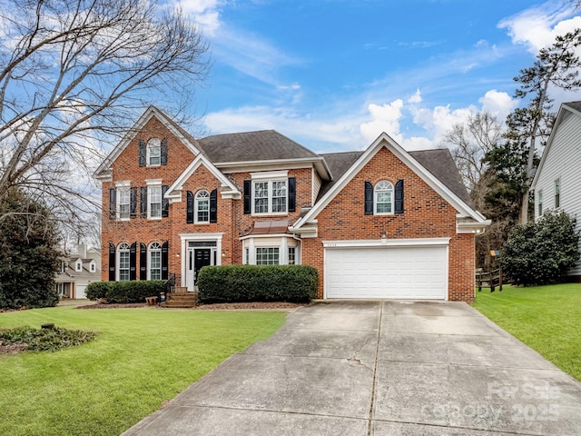 view of property with a garage and a front yard