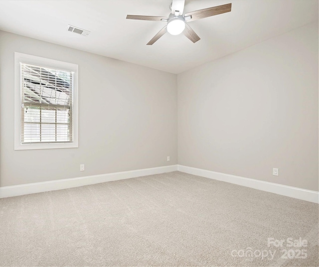 unfurnished room featuring carpet flooring and ceiling fan