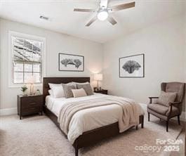 bedroom featuring ceiling fan and light carpet