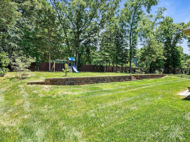 view of yard with a playground