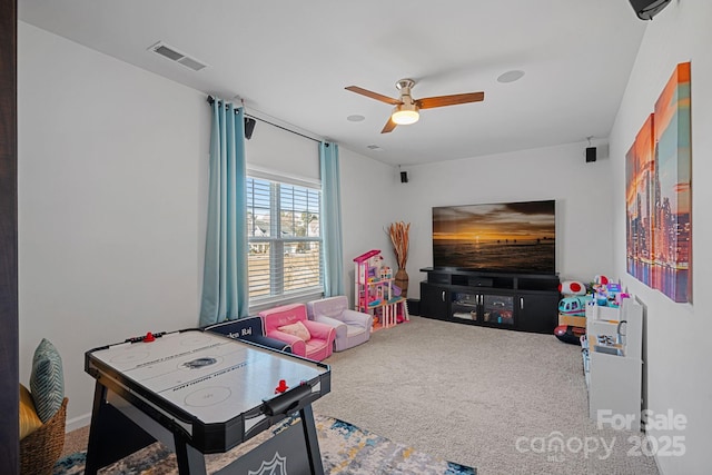 game room featuring ceiling fan and carpet floors