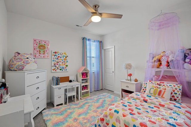 bedroom with ceiling fan and carpet floors